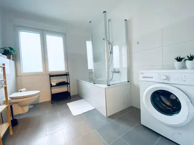 Ein Badezimmer in der Unterkunft Komfortable XXL Teamsuite mit 1,20 Betten