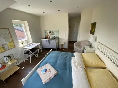 Ein Sitzbereich in der Unterkunft Bed and Breakfast Orange-Inn