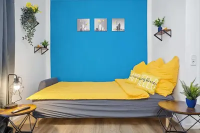 Ein Bett oder Betten in einem Zimmer der Unterkunft CASATUA - Zentral - Garage - Balkon - Uni - WiFi