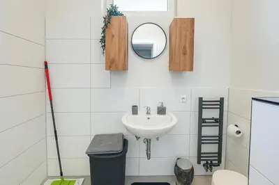 Ein Badezimmer in der Unterkunft Livemore24 - Apartment 2 in Herten 24-7 Check-In