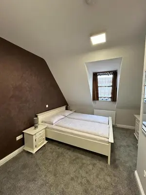 Ein Bett oder Betten in einem Zimmer der Unterkunft Sia Apartments Hotel