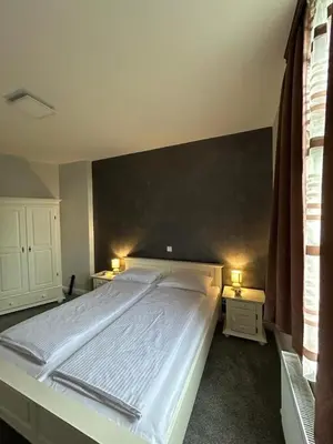 Ein Bett oder Betten in einem Zimmer der Unterkunft Sia Apartments Hotel