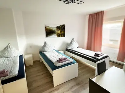 Ein Bett oder Betten in einem Zimmer der Unterkunft Gemütliche Apartments in Herten