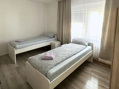 Ein Bett oder Betten in einem Zimmer der Unterkunft Gemütliche Apartments in Herten