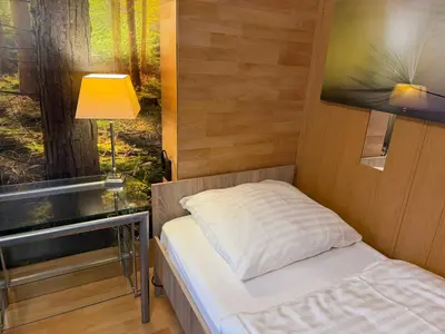 Ein Bett oder Betten in einem Zimmer der Unterkunft Apartments Düsseldorf City Center