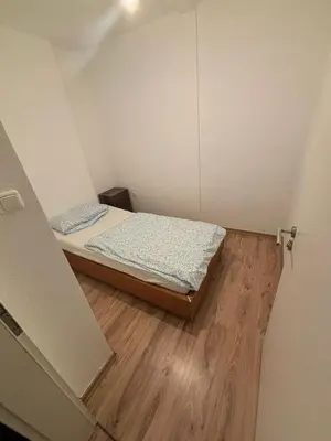 Ein Bett oder Betten in einem Zimmer der Unterkunft Speedstay oberhausen