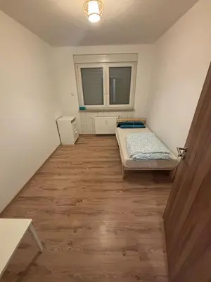 Ein Bett oder Betten in einem Zimmer der Unterkunft Speedstay oberhausen