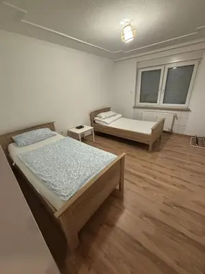 Ein Bett oder Betten in einem Zimmer der Unterkunft Speedstay oberhausen