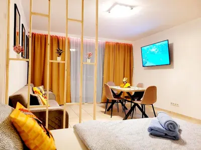 TV/Unterhaltungsangebot in der Unterkunft Wohnen auf Zeit mit Aussicht