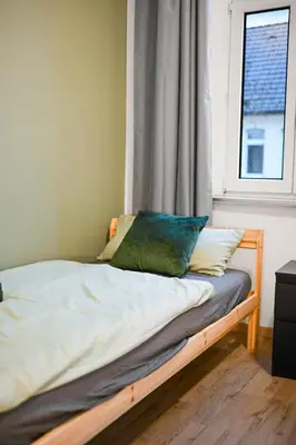 Ein Bett oder Betten in einem Zimmer der Unterkunft Perfect for 5 Guests - Netflix - Parking - Duisburg - Smart Home
