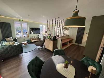 Ein Sitzbereich in der Unterkunft Suite Apartment No 1