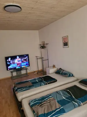 Ein Bett oder Betten in einem Zimmer der Unterkunft Guest-Apartment