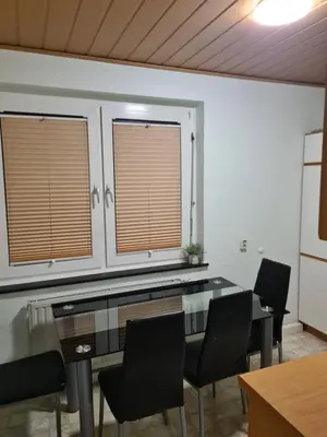 Der Geschäftsbereich oder Konferenzraum in der Unterkunft Guest-Apartment