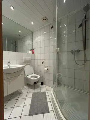 Ein Badezimmer in der Unterkunft Central Four Residence