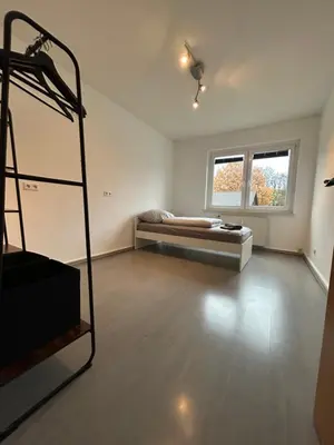 Ein Bett oder Betten in einem Zimmer der Unterkunft Central Four Residence