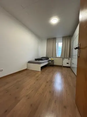 Ein Bett oder Betten in einem Zimmer der Unterkunft Central Four Residence