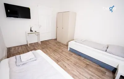 Ein Bett oder Betten in einem Zimmer der Unterkunft BEGE APARTMENTS StillSpace