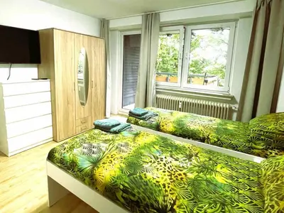 Ein Bett oder Betten in einem Zimmer der Unterkunft Wohnung mit Balkon in Wuppertal