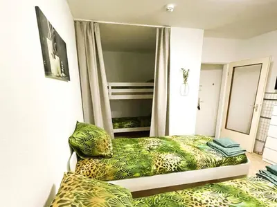 Ein Bett oder Betten in einem Zimmer der Unterkunft Wohnung mit Balkon in Wuppertal