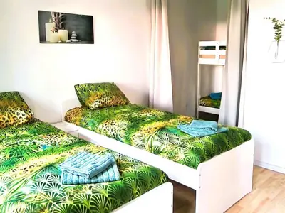 Ein Bett oder Betten in einem Zimmer der Unterkunft Wohnung mit Balkon in Wuppertal