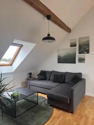 Ein Sitzbereich in der Unterkunft Easystay