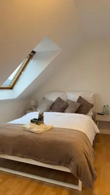 Ein Bett oder Betten in einem Zimmer der Unterkunft Easystay