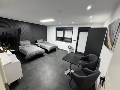 Ein Bett oder Betten in einem Zimmer der Unterkunft Modern Apartments, Wohnung Nr 3, nahe Schalke Arena, Zentral zur Autobahn A42 und A2, Ferienwohnung, Monteurwohnung