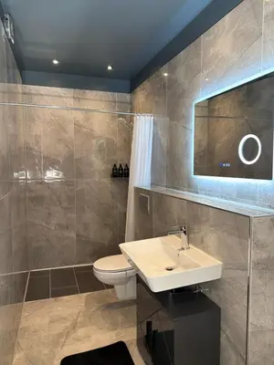 Ein Badezimmer in der Unterkunft Moderne City-Studio Suite nähe Köln & Düsseldorf