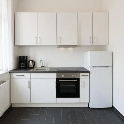 Küche/Küchenzeile in der Unterkunft Polsumer Residence Moderne Unterkunft für Monteure & Familien nahe Veltins-Arena, Movie Park, Nordsternpark, Amphitheater & Autobahnen A2 & A42 mit Balkon