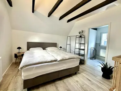 Ein Bett oder Betten in einem Zimmer der Unterkunft Altstadt Apartment Chalet