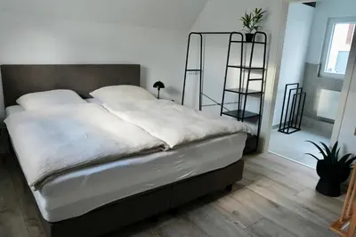 Ein Bett oder Betten in einem Zimmer der Unterkunft Altstadt Apartment Chalet