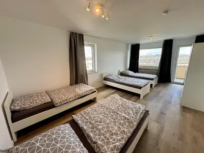 Ein Bett oder Betten in einem Zimmer der Unterkunft 8P apartment in Wuppertal with balcony and view