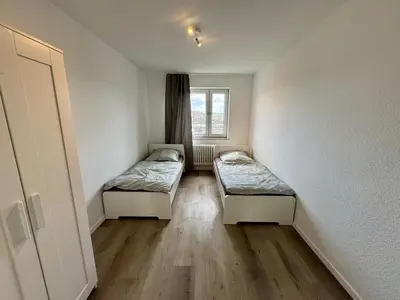 Ein Bett oder Betten in einem Zimmer der Unterkunft 8P apartment in Wuppertal with balcony and view