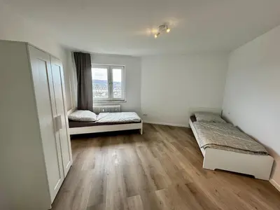 Ein Bett oder Betten in einem Zimmer der Unterkunft 8P apartment in Wuppertal with balcony and view
