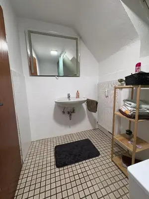 Ein Badezimmer in der Unterkunft Wohnung 1&2