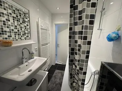 Ein Badezimmer in der Unterkunft Wohnung 1&2