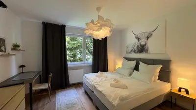 Ein Bett oder Betten in einem Zimmer der Unterkunft Zentrales Apartment in Wuppertal direkt am Hbf