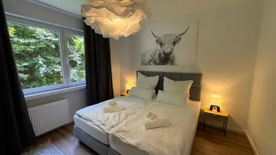 Ein Bett oder Betten in einem Zimmer der Unterkunft Zentrales Apartment in Wuppertal direkt am Hbf