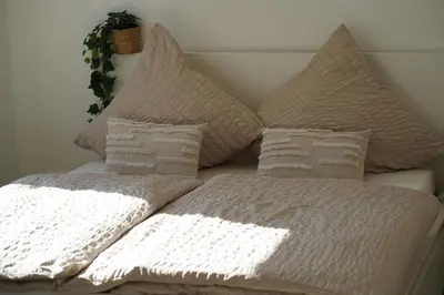 Ein Bett oder Betten in einem Zimmer der Unterkunft MD City Appartment