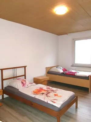 Ein Bett oder Betten in einem Zimmer der Unterkunft SHK - möbliert - WIFI - HAGEN