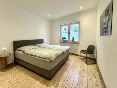 Ein Bett oder Betten in einem Zimmer der Unterkunft Altstadt Apartment Deluxe 1