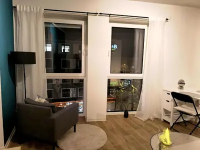 Ein Sitzbereich in der Unterkunft Modernes City-Appartement mit separatem Schlafzimmer