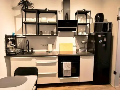 Küche/Küchenzeile in der Unterkunft Modernes City-Appartement mit separatem Schlafzimmer