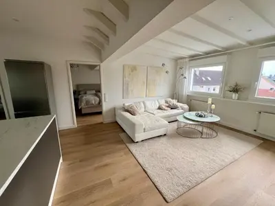Ein Sitzbereich in der Unterkunft Living in Ohligs Dachgeschoss 4 Personen