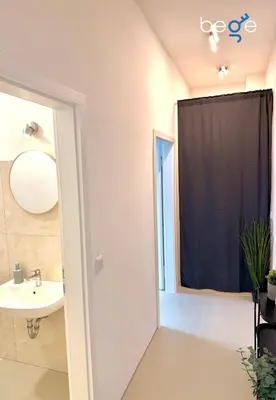 Ein Badezimmer in der Unterkunft BEGE APARTMENTS City Residence