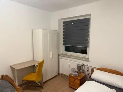 Ein Bett oder Betten in einem Zimmer der Unterkunft City Apartment 3 #Netflix &Wlan &Kaffee Maschine & Zentral & 500m Innenhafen & 2 min U Bahn