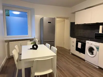Küche/Küchenzeile in der Unterkunft T&K Apartments - Gelsenkirchen - 2 Schlafzimmer Wohnungen - Vollausgestattet