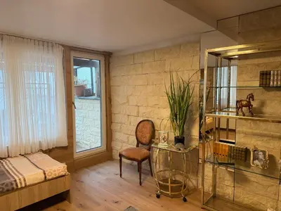 Ein Bett oder Betten in einem Zimmer der Unterkunft City Adler Apartment