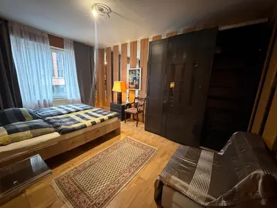 Ein Bett oder Betten in einem Zimmer der Unterkunft City Adler Apartment