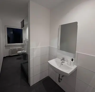 Ein Badezimmer in der Unterkunft H&H Duisburg
